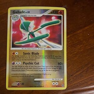 Pokemon Gallade Card with Red and Green Accents
